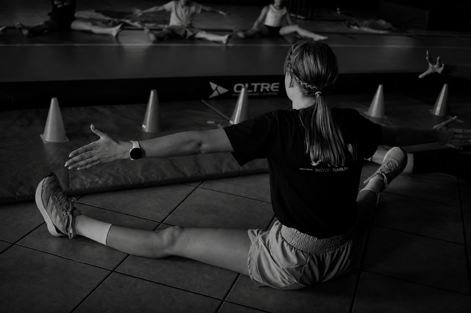 Toddler and parent playing together on gym mats
